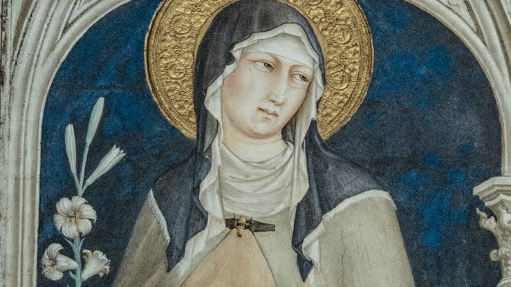 Santa Clara entre lirios